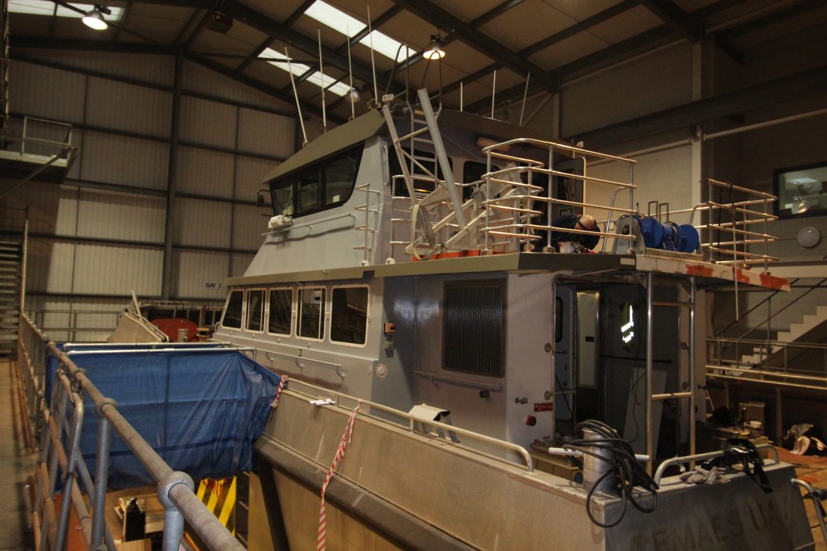 Upper deck railings being fitted
